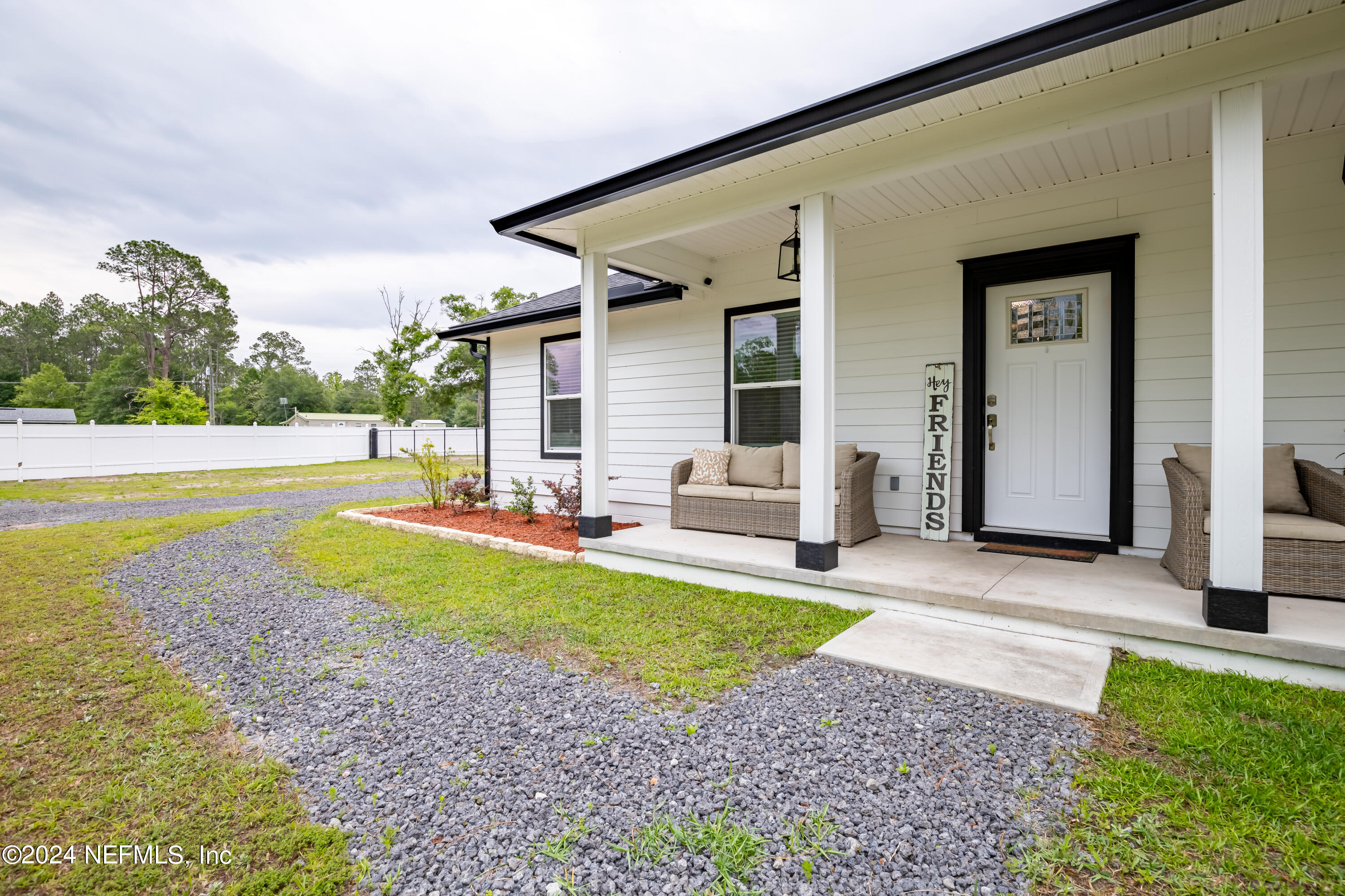 6477 Keith Griffis Circle Macclenny, FL 32063 - Photo 10 of 30 a view of a house with backyard and sitting area