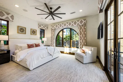 a living room with furniture fireplace and a flat screen tv