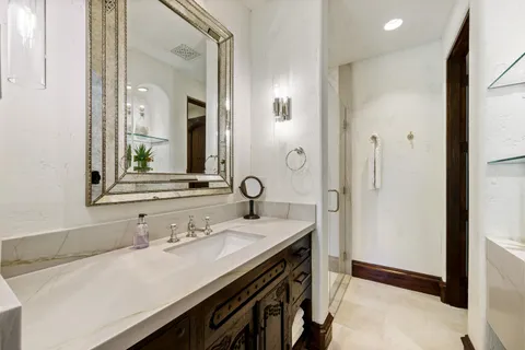 a view of swimming pool with a patio and a garden