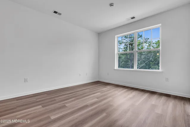 a view of a balcony with plants