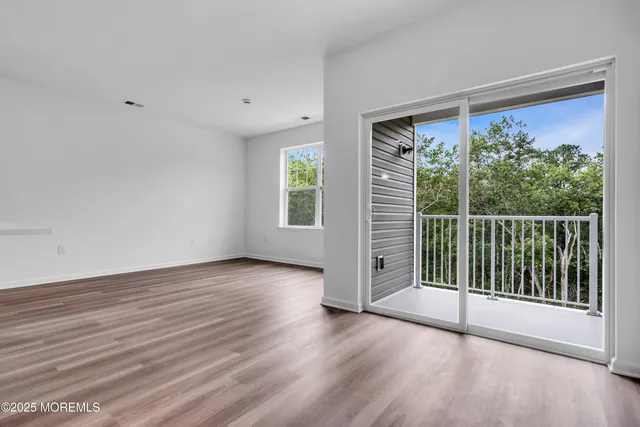 a bathroom with a double vanity sink toilet and shower