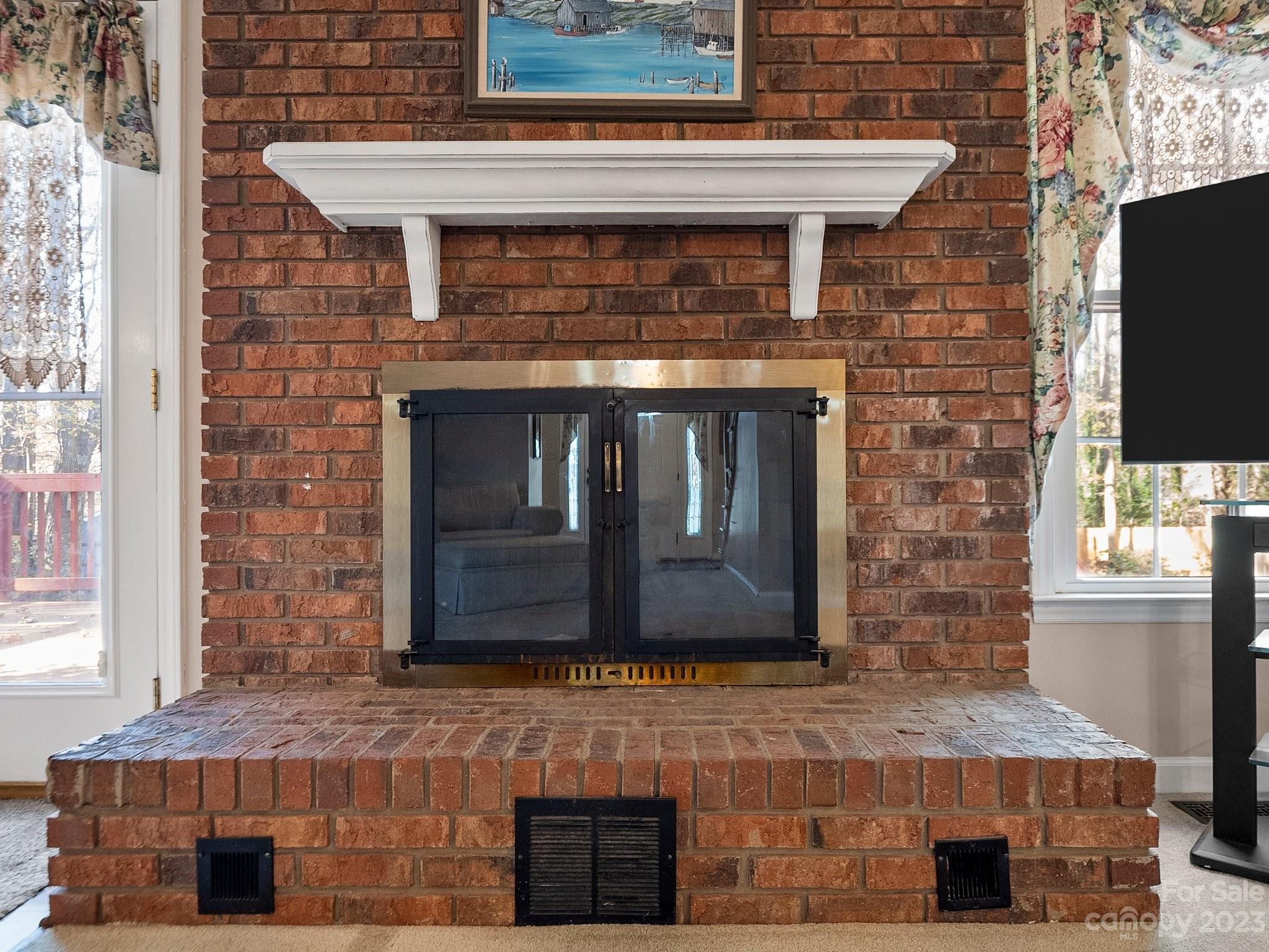 8211 Plott Road Charlotte, NC 28215 - Photo 12 of 38 a stove top oven sitting inside of a kitchen