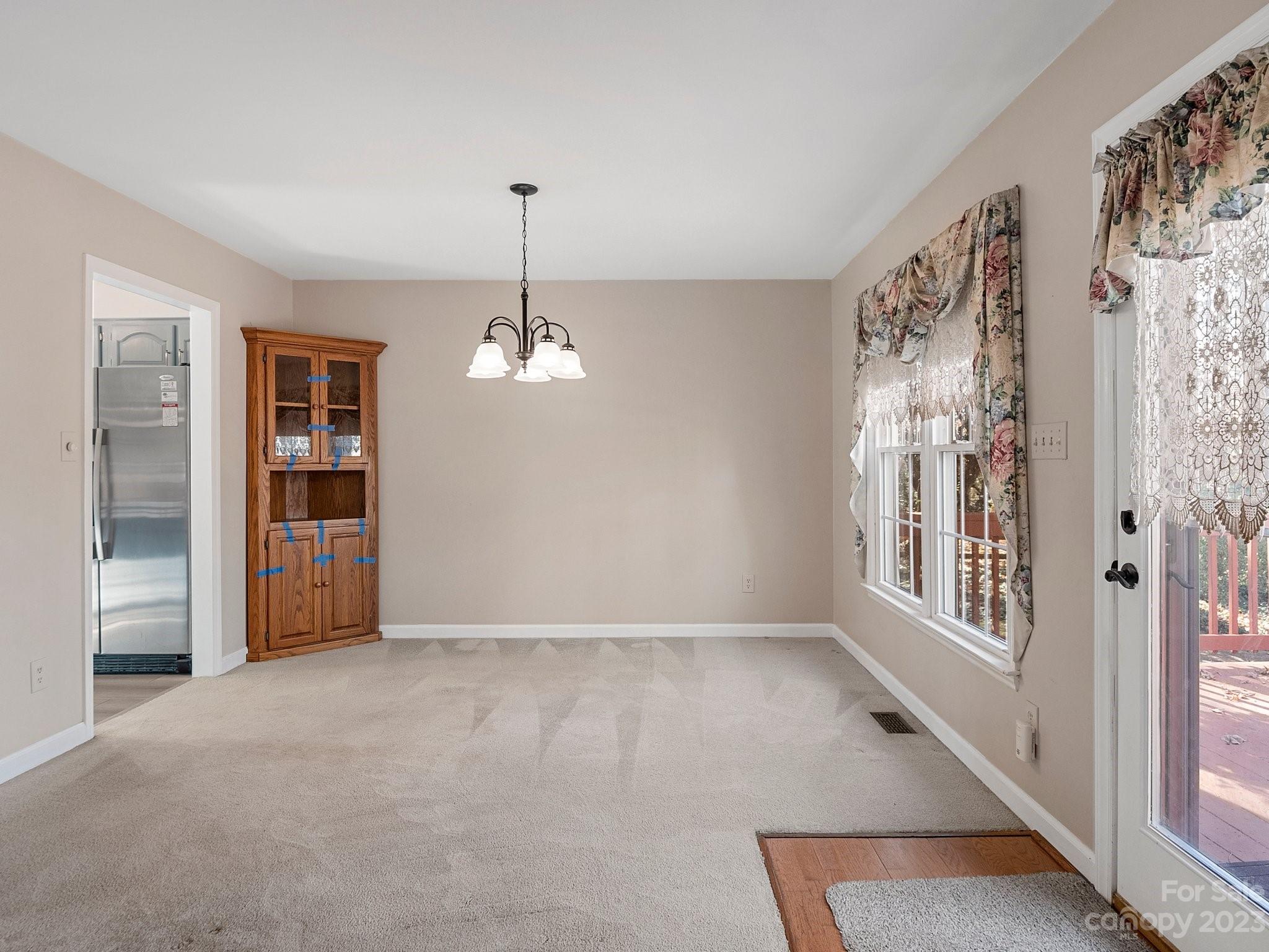8211 Plott Road Charlotte, NC 28215 - Photo 13 of 38 a view of livingroom with window