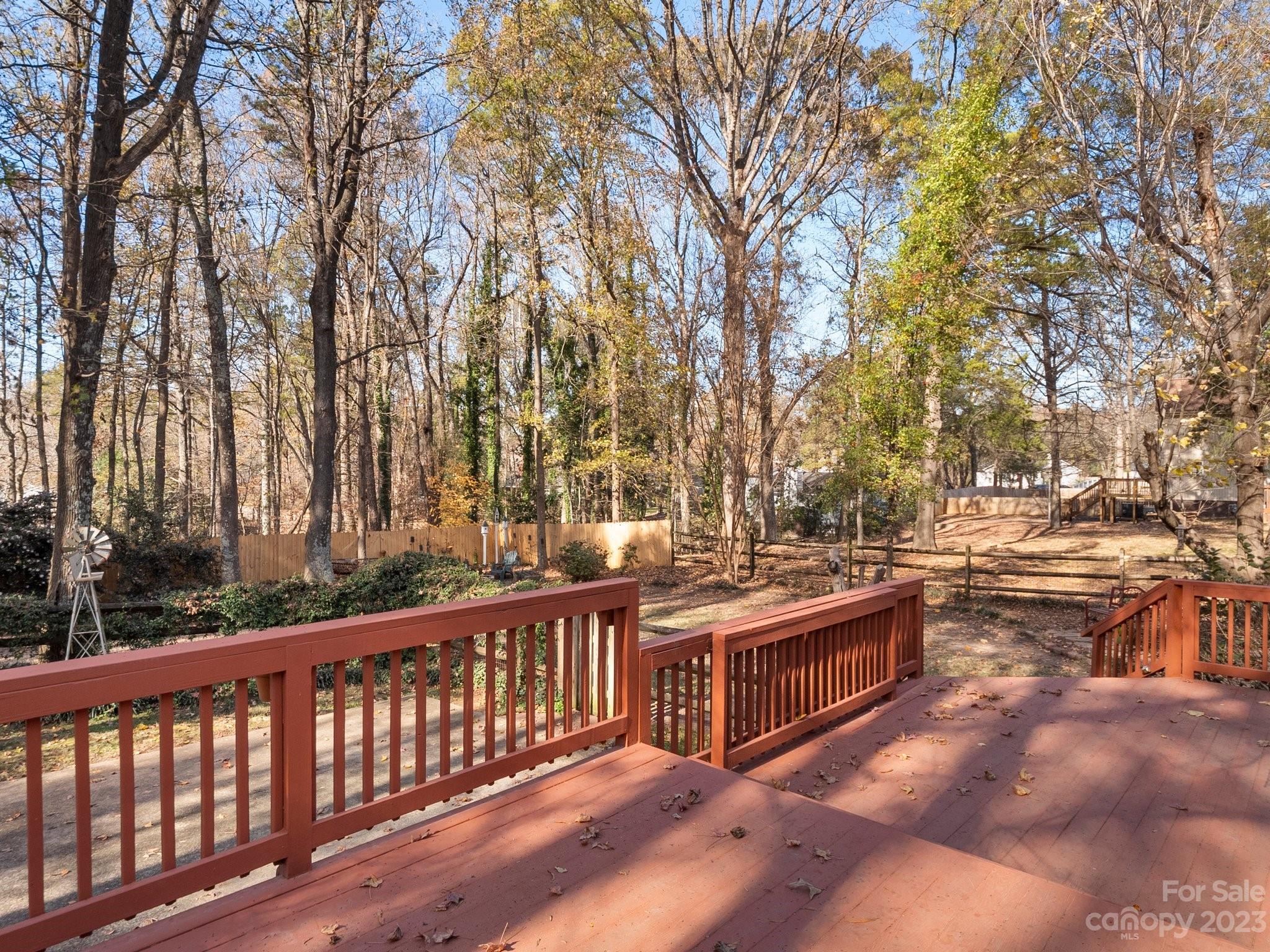 8211 Plott Road Charlotte, NC 28215 - Photo 33 of 38 a view of a street with wooden fence