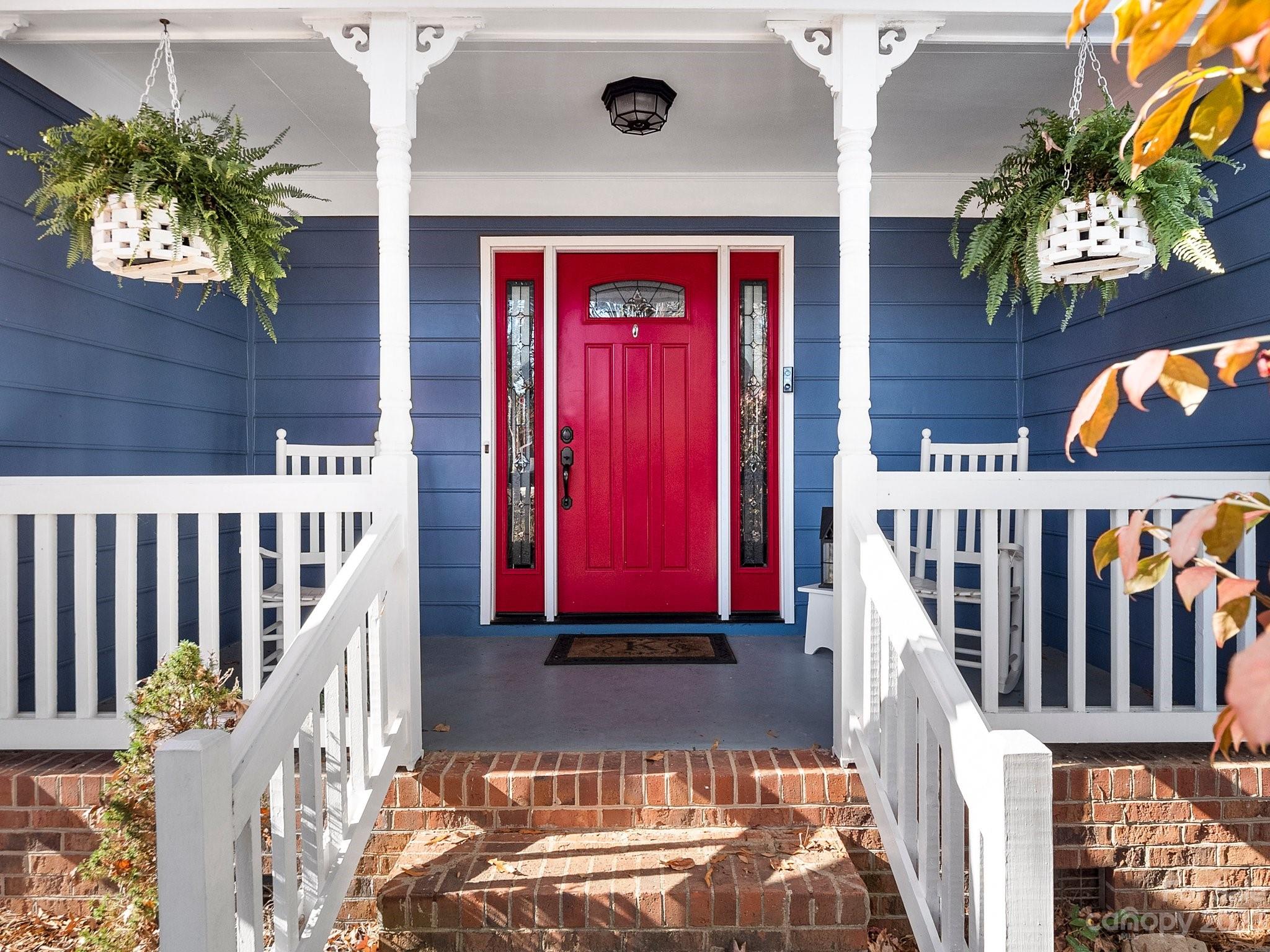 8211 Plott Road Charlotte, NC 28215 - Photo 4 of 38 a front view of a house with a yard
