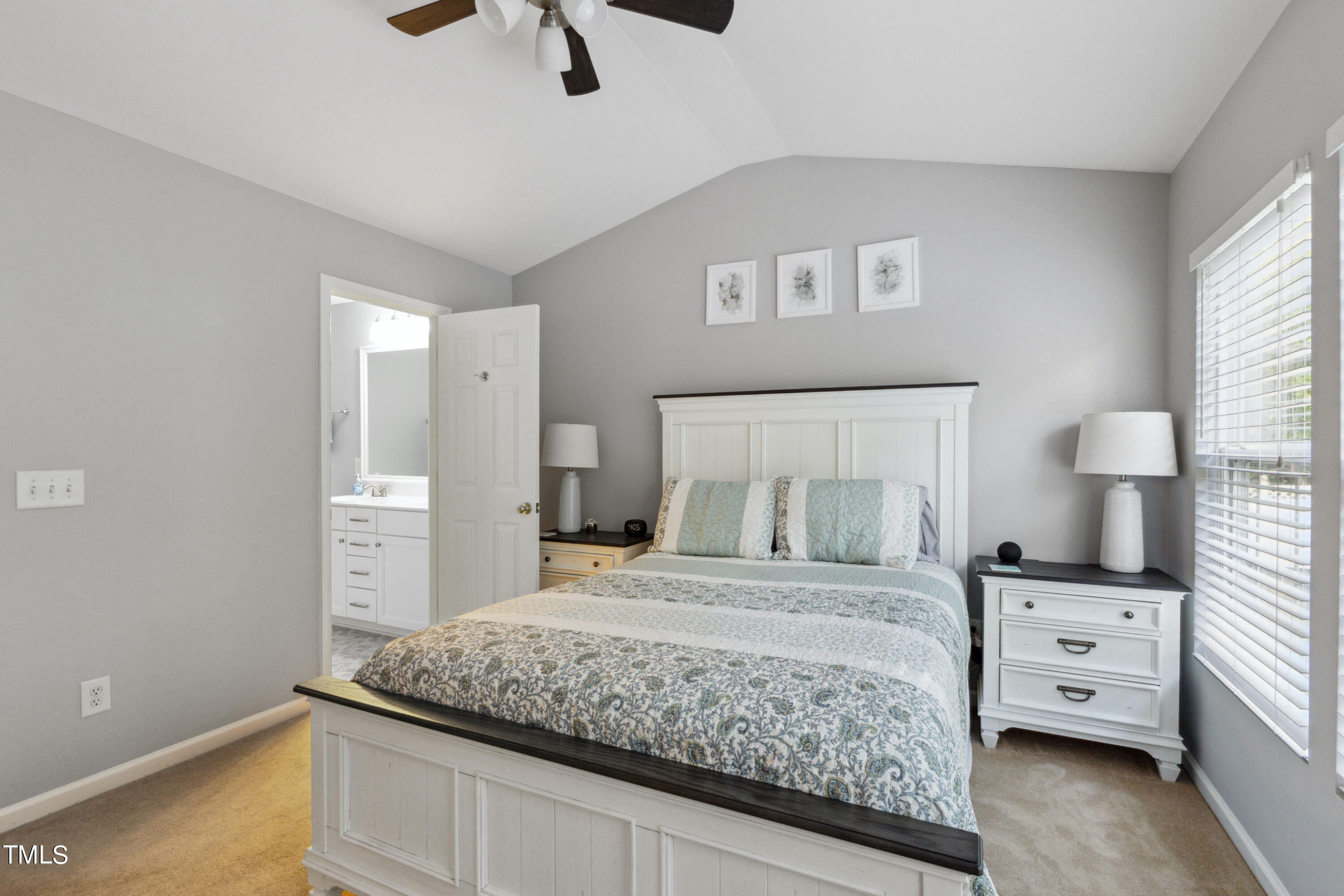 1824 Natalie Brook Way Raleigh, NC 27609 - Photo 14 of 28 a bedroom with a bed and a closet