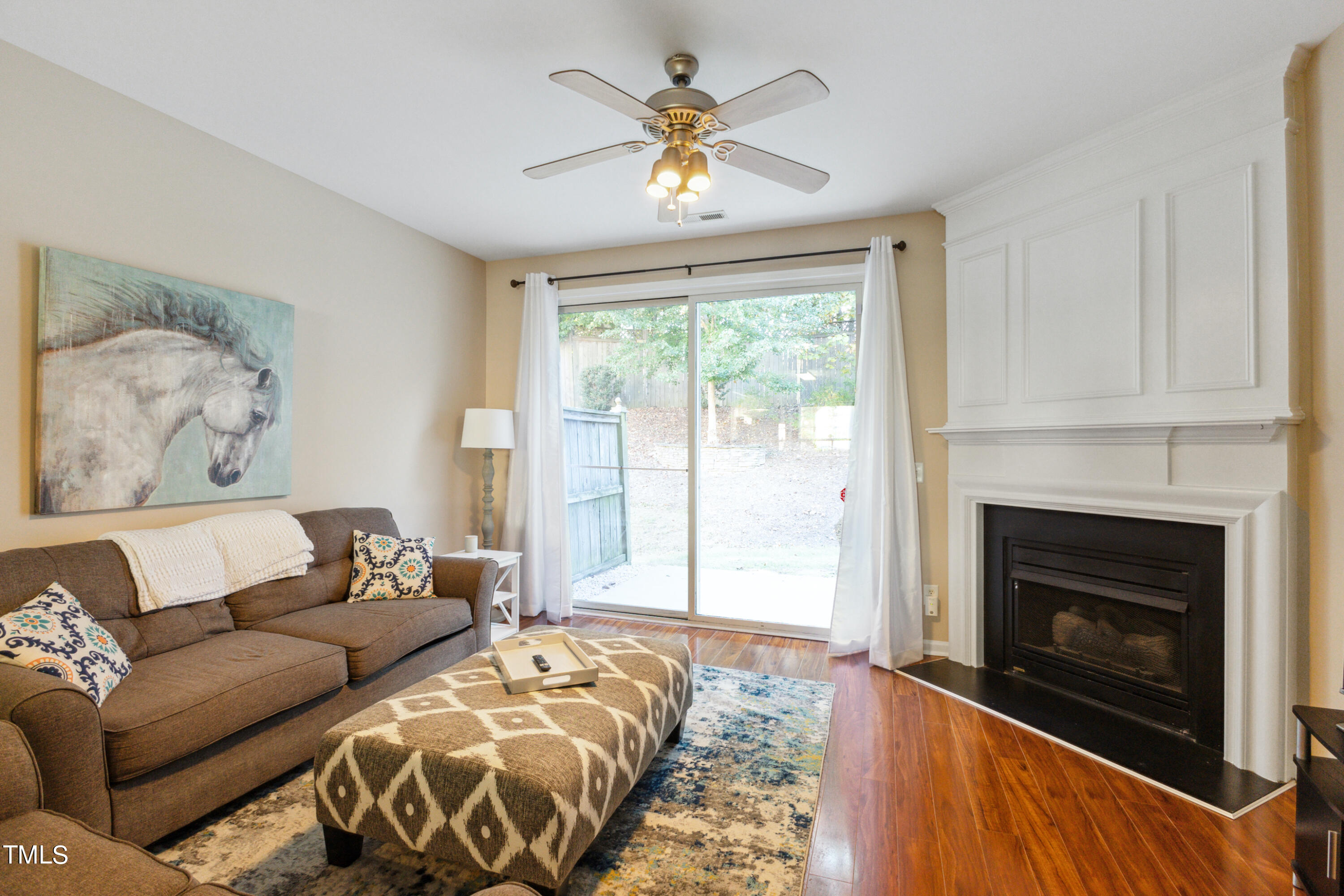 1824 Natalie Brook Way Raleigh, NC 27609 - Photo 5 of 28 a bedroom with a bed and a fireplace