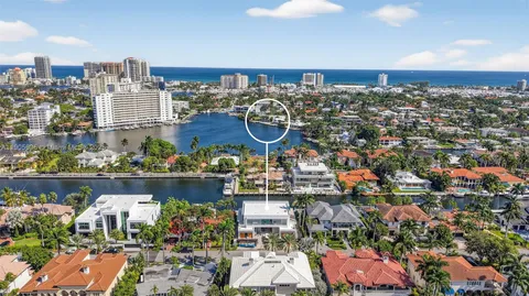 an aerial view of a building with outdoor seating