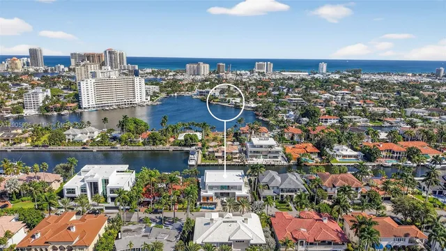 an aerial view of a building with outdoor seating