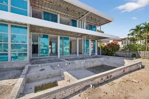 an aerial view of a house with a garden