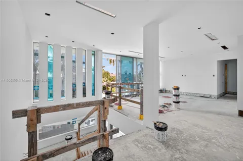 a swimming pool with outdoor seating and yard