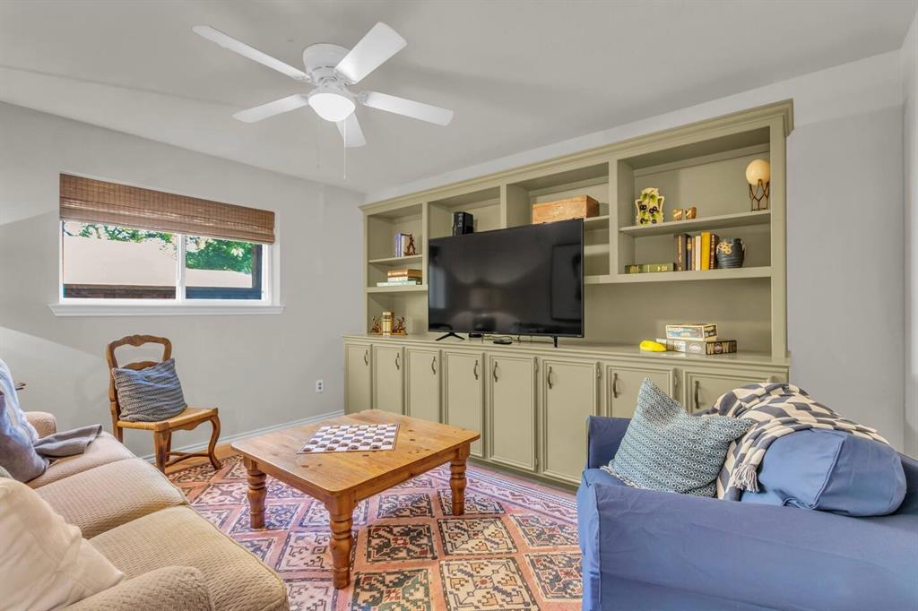 9780 North County Road Frisco, TX 75033 - Photo 15 of 36 a living room with furniture and a flat screen tv