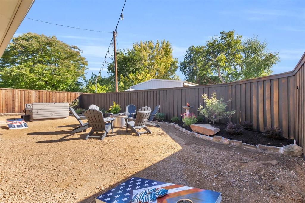 9780 North County Road Frisco, TX 75033 - Photo 34 of 36 a view of a backyard with plants and a patio