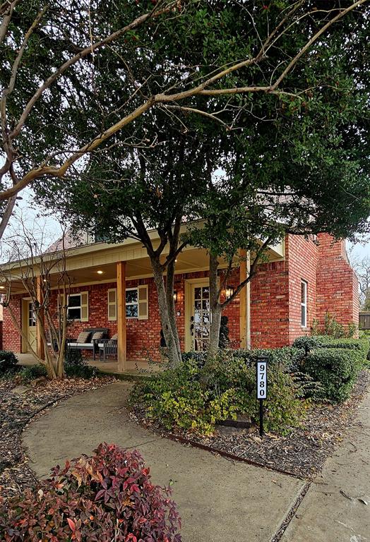 9780 North County Road Frisco, TX 75033 - Photo 35 of 36 a front view of a house with garden
