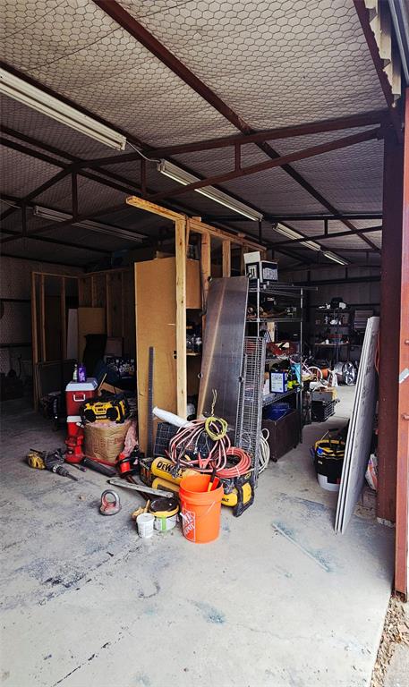 9780 North County Road Frisco, TX 75033 - Photo 36 of 36 a view of a garage with storage