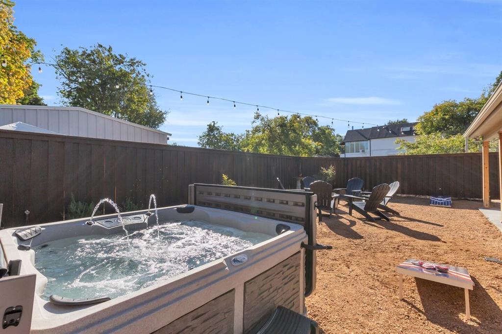 9780 North County Road Frisco, TX 75033 - Photo 5 of 36 a backyard of a house with table and chairs