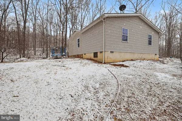a view of a backyard of a house
