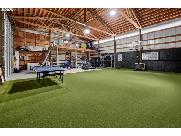 a view of a backyard with a patio and a patio