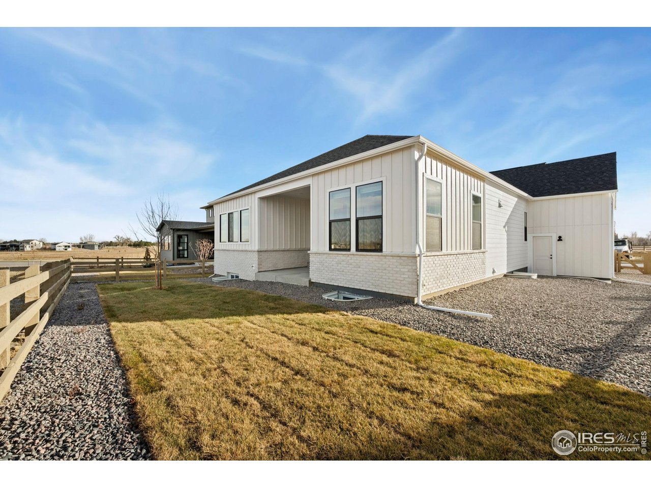 1426 Alyssa Drive Timnath, CO 80547 - Photo 15 of 15 a view of a house with backyard