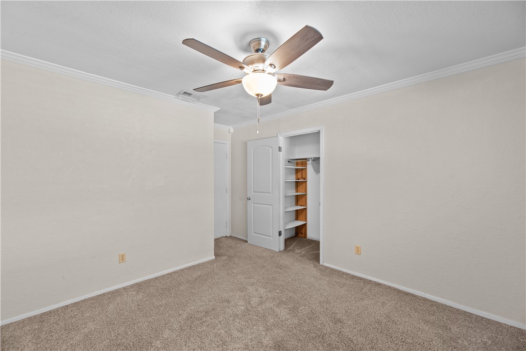 1305 Harbor Lights Drive Corpus Christi, TX 78412 - Photo 20 of 31 an empty room with closet and windows