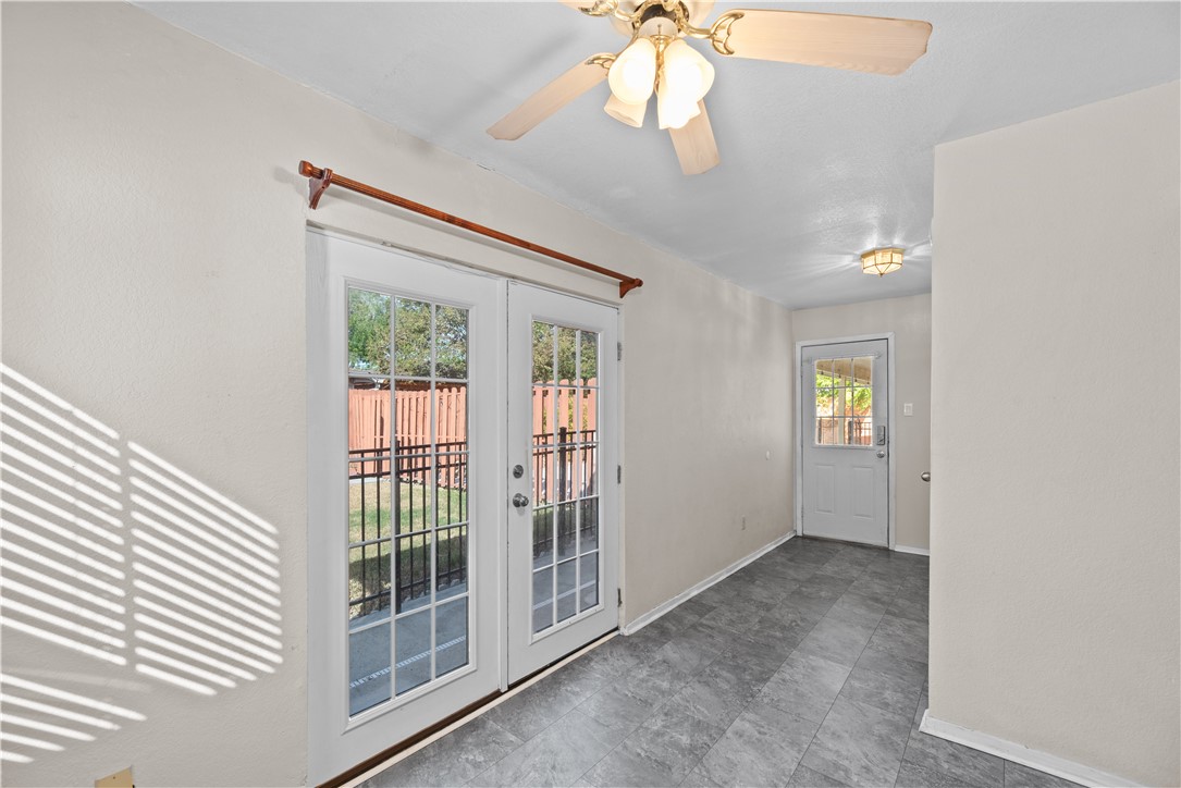 1305 Harbor Lights Drive Corpus Christi, TX 78412 - Photo 22 of 31 wooden floor in an empty room with a window