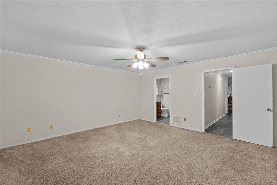1305 Harbor Lights Drive Corpus Christi, TX 78412 - Photo 8 of 31 a view of a livingroom with a ceiling fan and window