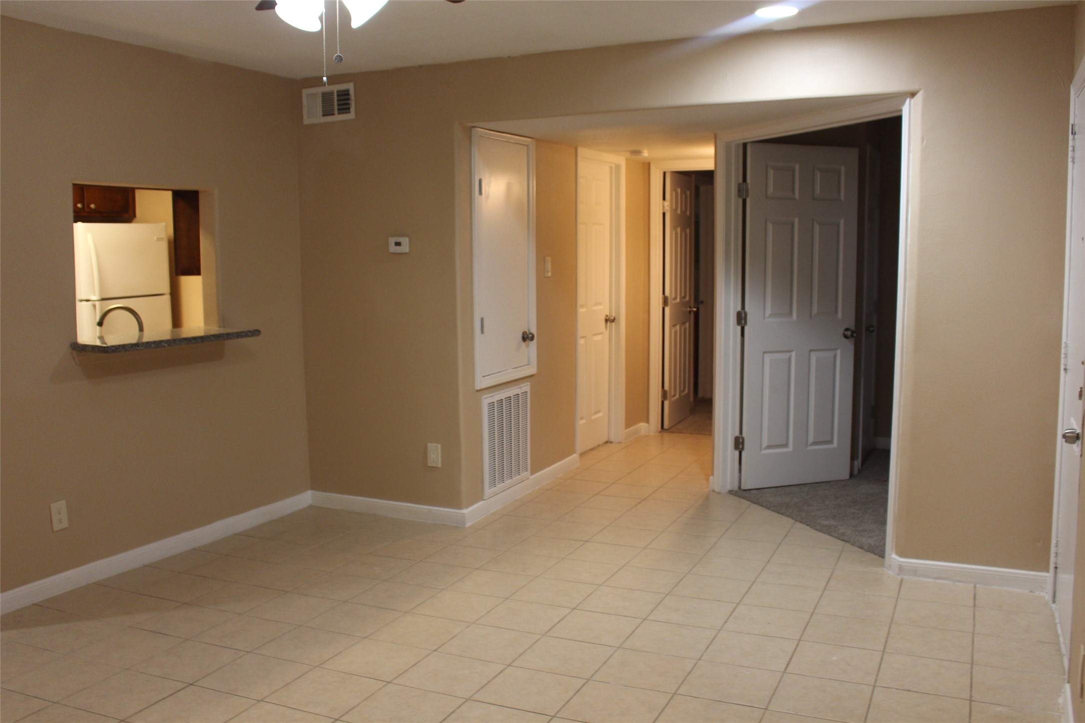 16111 Aspenglenn Drive, Unit 1001 Houston, TX 77084 - Photo 9 of 17 a view of an empty room with a bathroom
