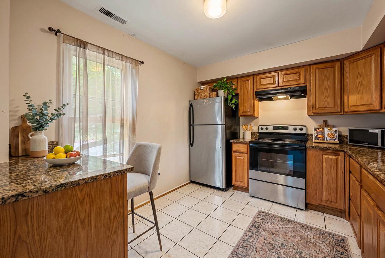 9338 Canterbury Riding Laurel, MD 20723 - Photo 4 of 34 Virtually Staged Kitchen