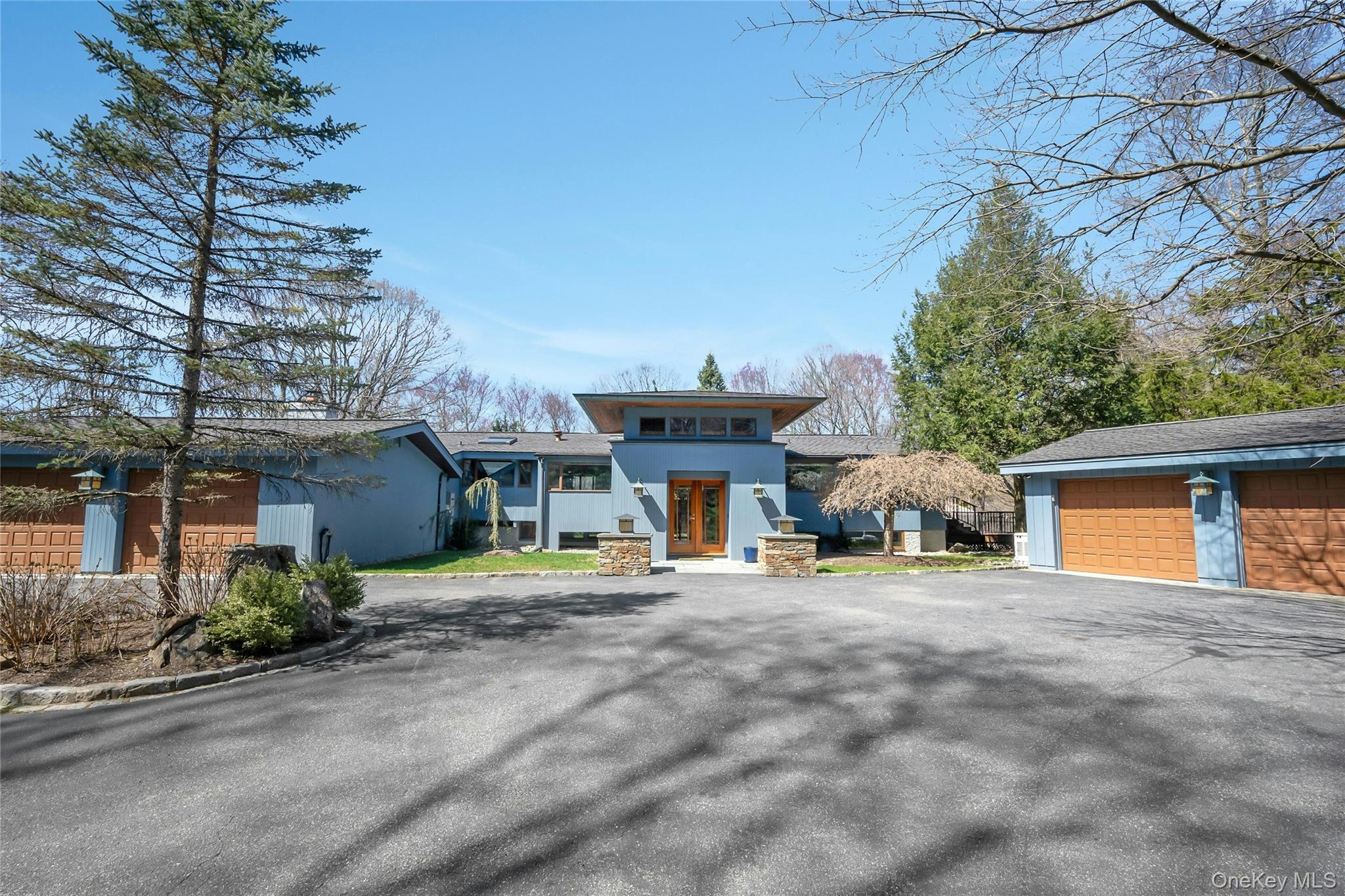 120 Kitchawan Road Pound Ridge, NY 10576 - Photo 1 of 40 a view of a house with sitting area and trees