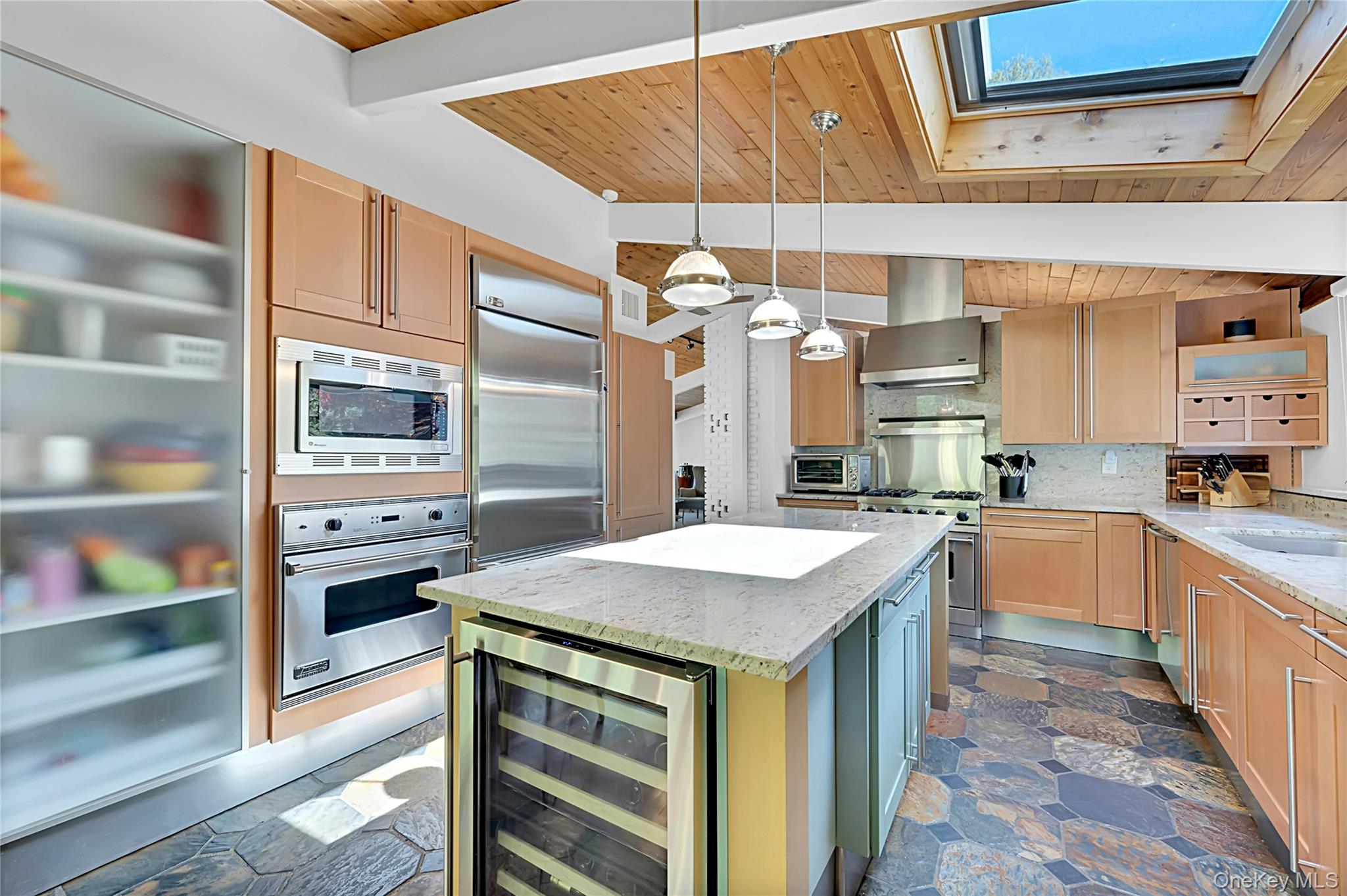 120 Kitchawan Road Pound Ridge, NY 10576 - Photo 15 of 40 a kitchen with stainless steel appliances a sink and a refrigerator