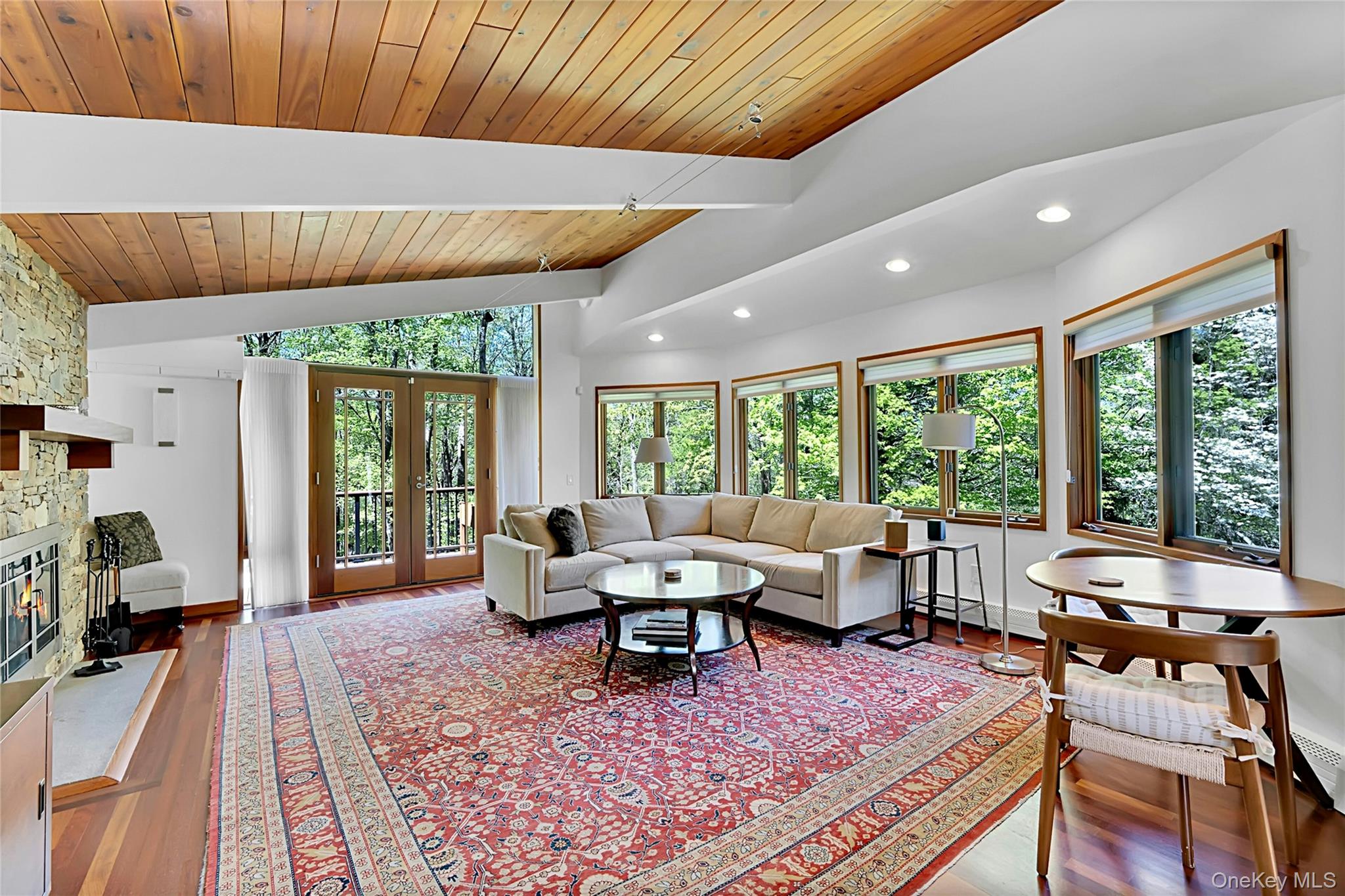 120 Kitchawan Road Pound Ridge, NY 10576 - Photo 17 of 40 a living room with furniture and a rug