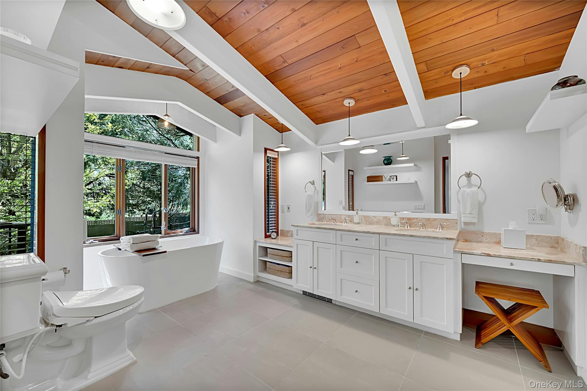 120 Kitchawan Road Pound Ridge, NY 10576 - Photo 21 of 40 a bathroom with a granite countertop sink mirror and bathtub
