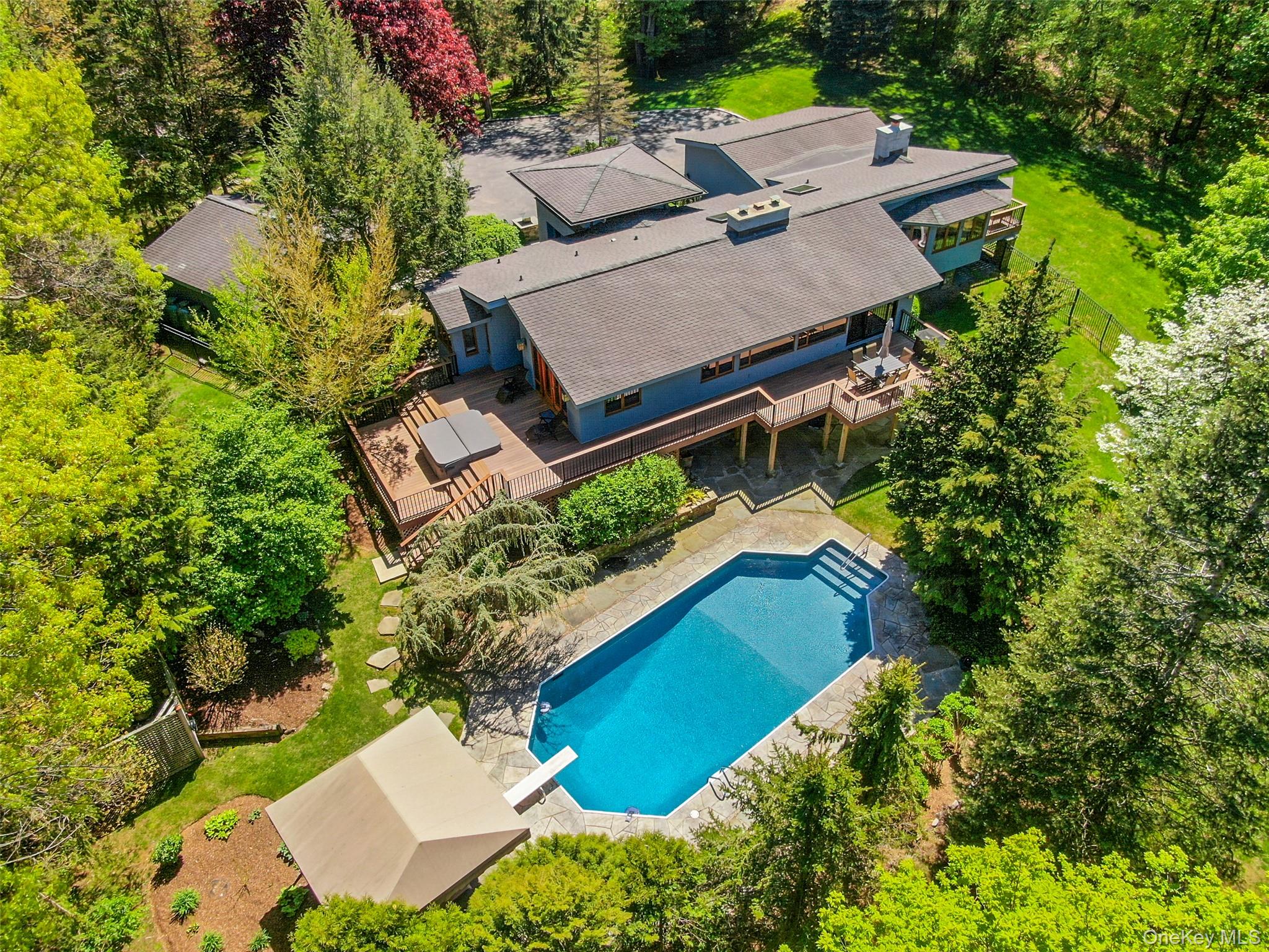 120 Kitchawan Road Pound Ridge, NY 10576 - Photo 3 of 40 an aerial view of a house with yard swimming pool and outdoor seating