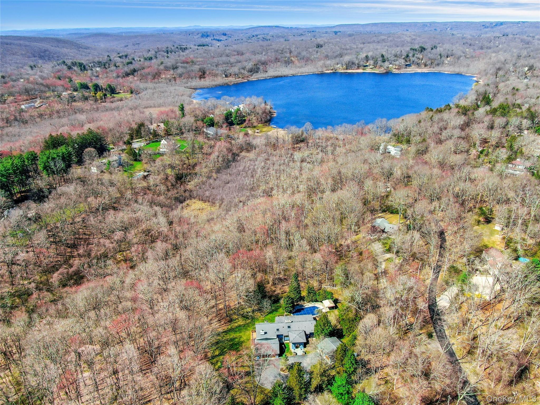 120 Kitchawan Road Pound Ridge, NY 10576 - Photo 37 of 40 a view of a lake with mountains and valleys