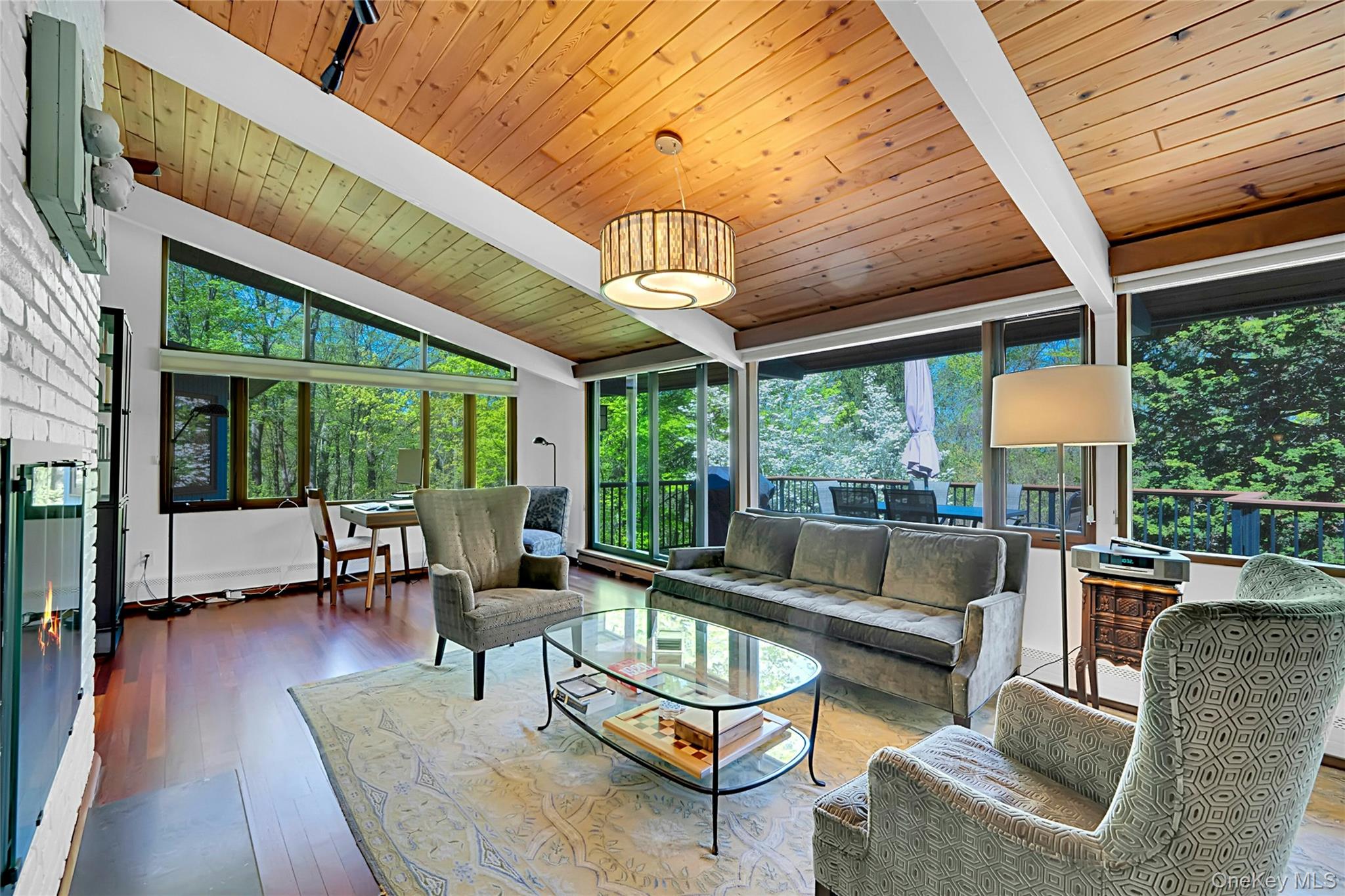 120 Kitchawan Road Pound Ridge, NY 10576 - Photo 10 of 40 a living room with furniture and a large window