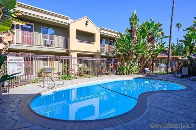 a view of a house with swimming pool