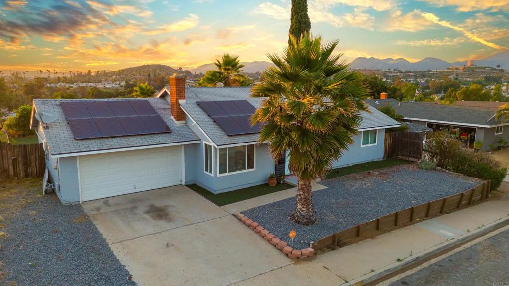 8543 Via Consuelo El Cajon, CA 92021 - Photo 46 of 51 a view of a house with a yard