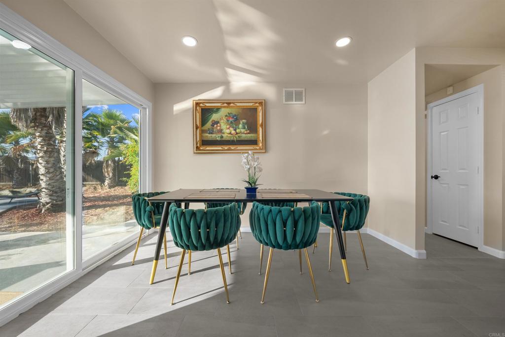 8543 Via Consuelo El Cajon, CA 92021 - Photo 8 of 51 a view of a dining room with furniture window and outside view
