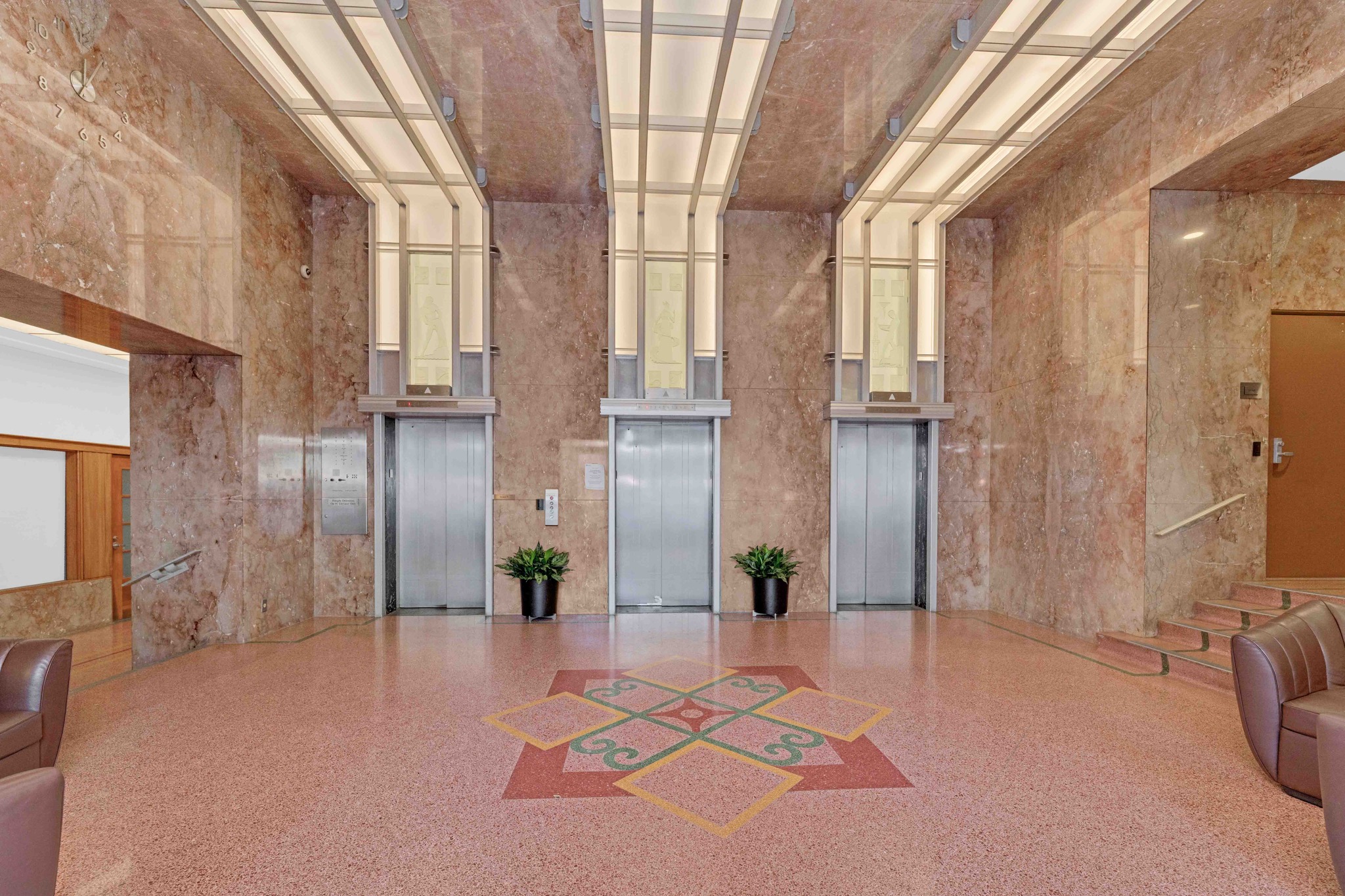 710 Colorado Street, Unit 8C Austin, TX 78701 - Photo 2 of 30 Building lobby with Art Deco finishes and elevator access