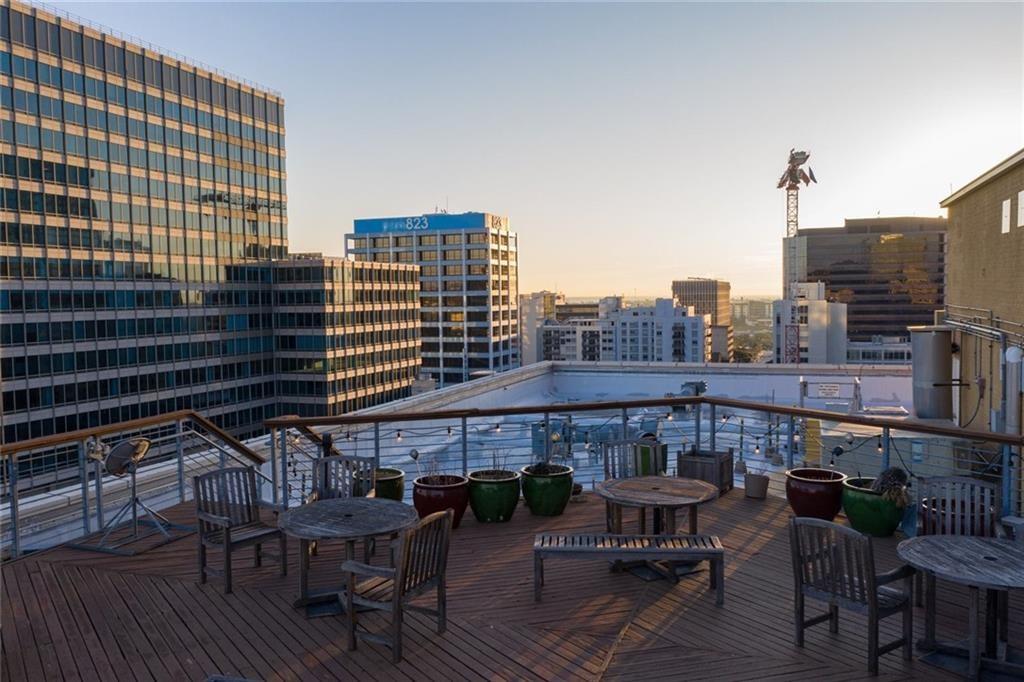 710 Colorado Street, Unit 8C Austin, TX 78701 - Photo 26 of 30 Wooden terrace with a view of city