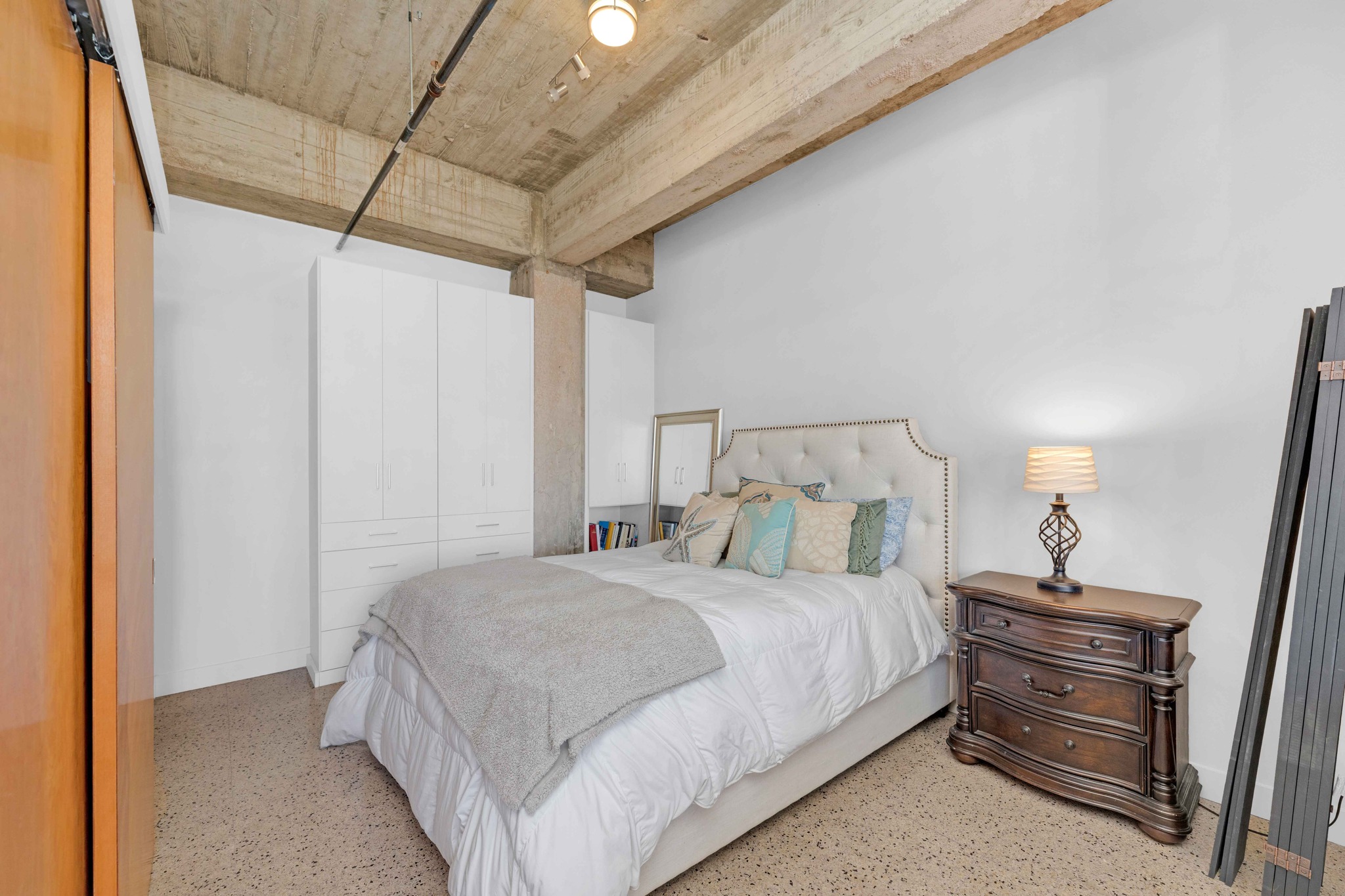 710 Colorado Street, Unit 8C Austin, TX 78701 - Photo 5 of 30 Bedroom area with custom built-in storage