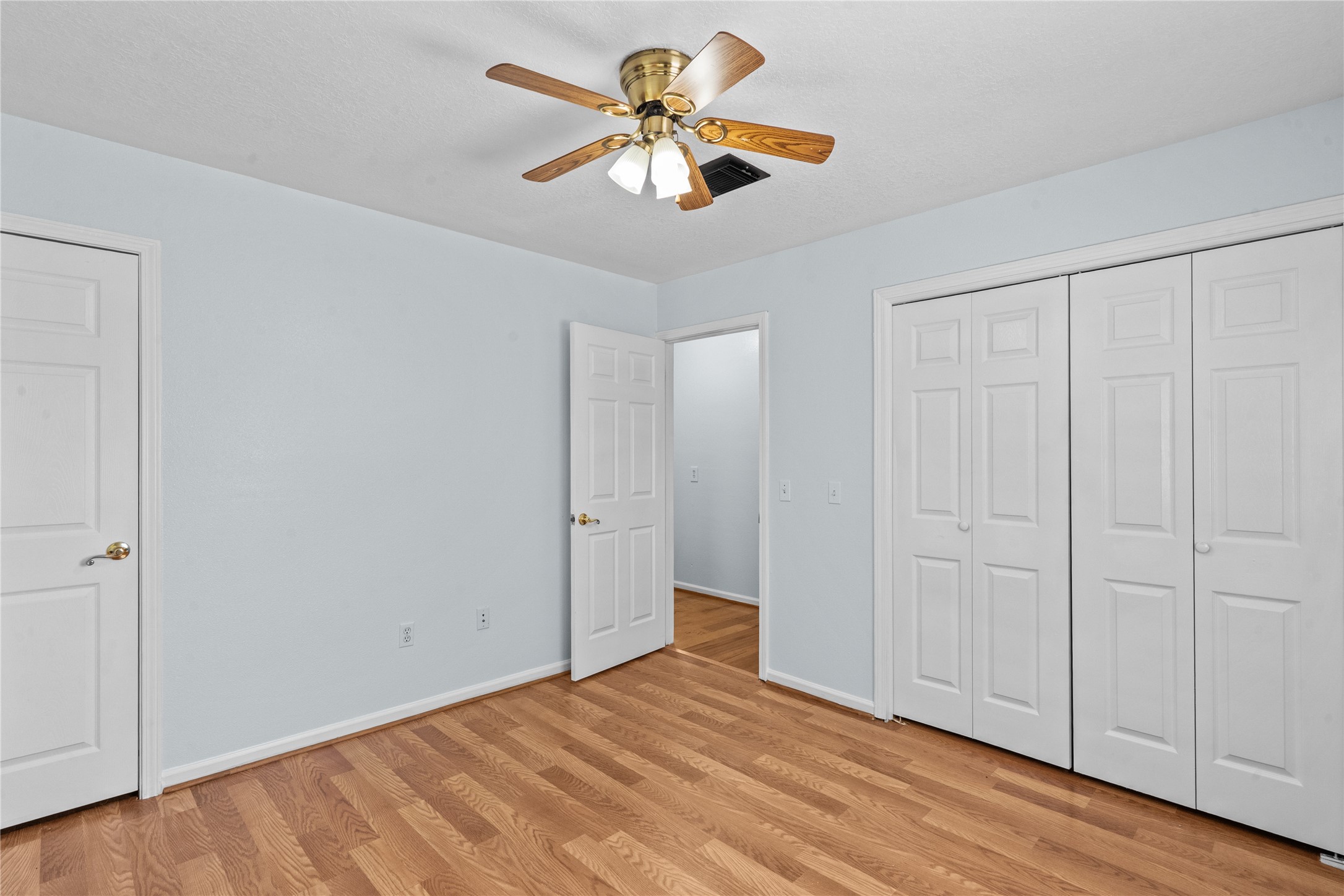 336 Reppert Street, Unit A Bacliff, TX 77518 - Photo 11 of 17 a view of an empty room with window a ceiling fan