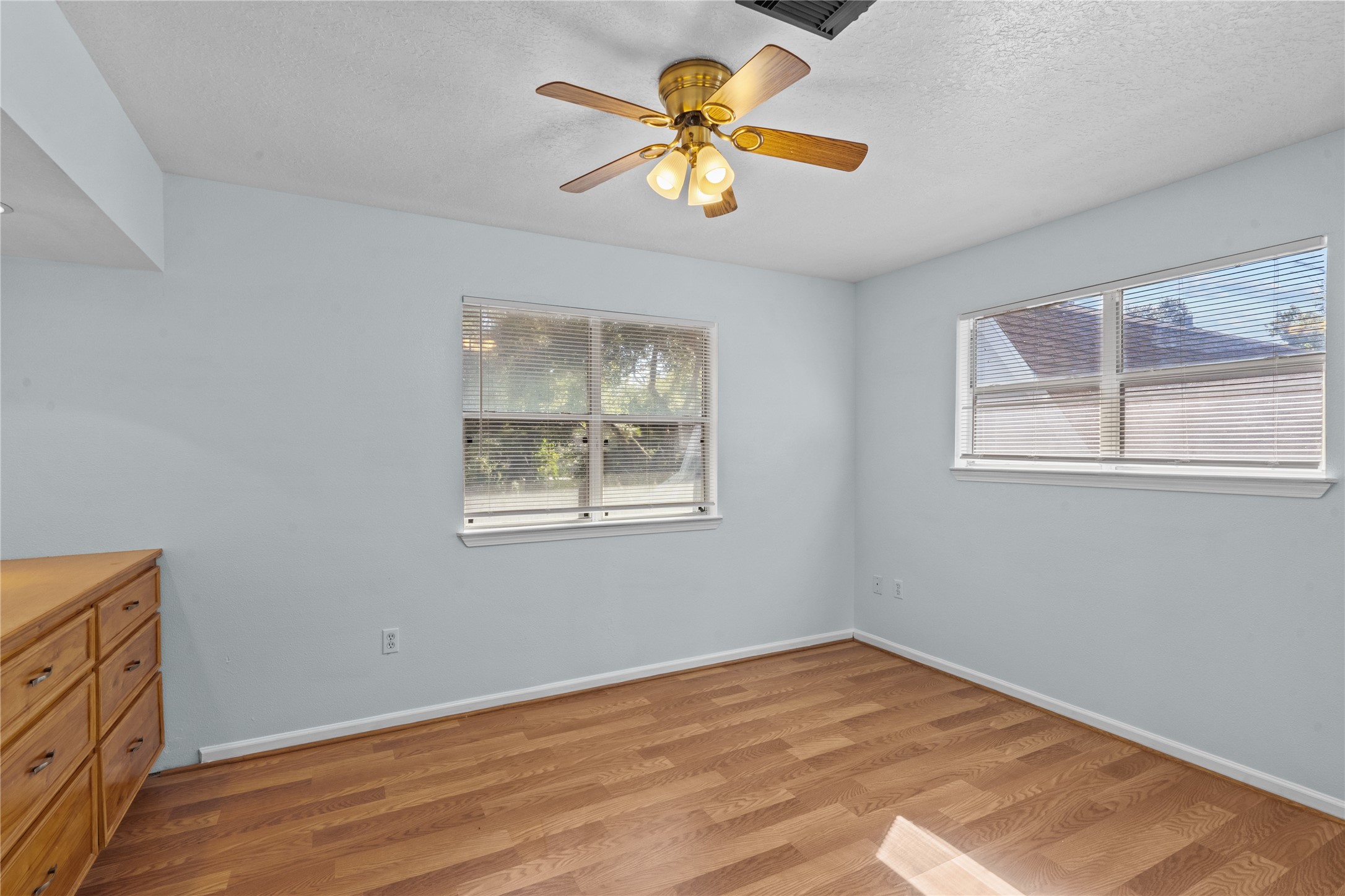 336 Reppert Street, Unit A Bacliff, TX 77518 - Photo 17 of 17 a view of workspace with wooden floor and a window