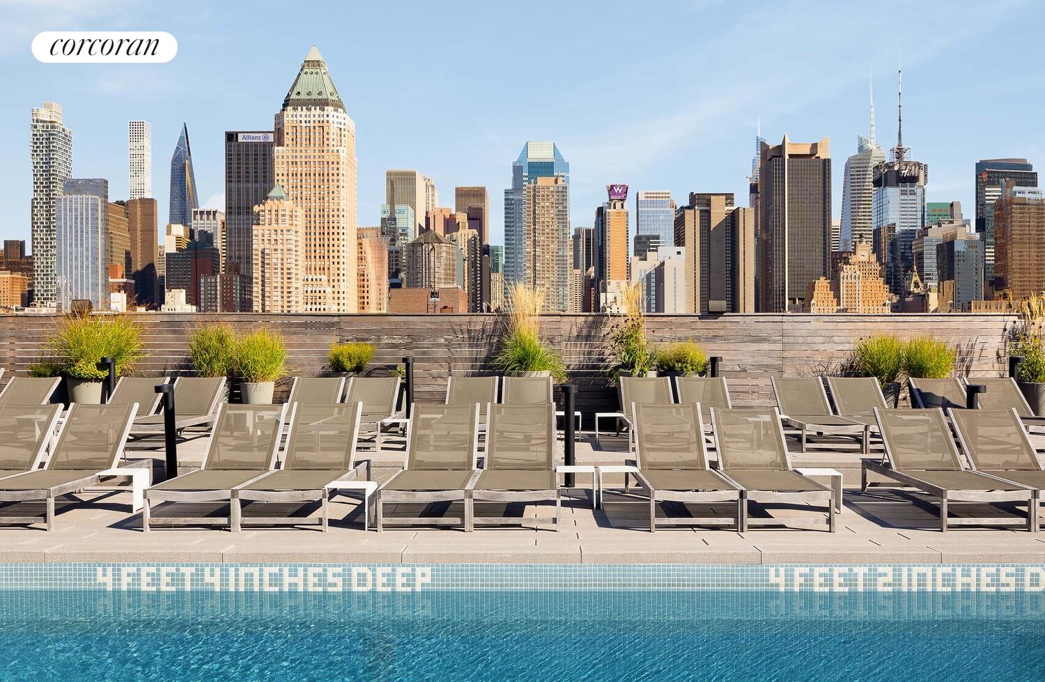 547 West 47th Street, Unit 405 Manhattan, NY 10036 - Photo 12 of 28 a view of a city with tall buildings