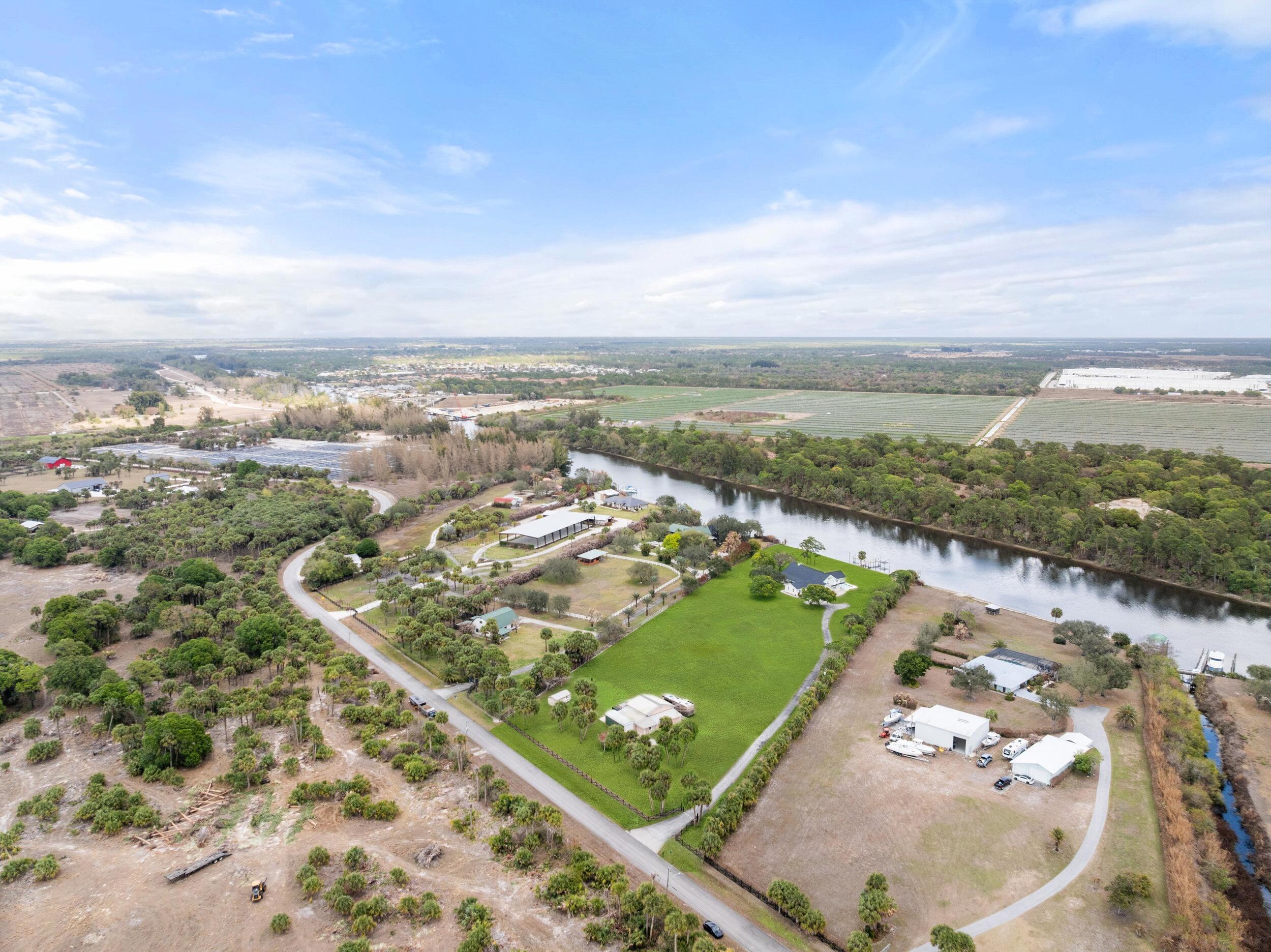 10125 Southwest Green Ridge Lane, Unit LANE Palm City, FL 34990 - Photo 82 of 84 66_dji_20260227035903_0129_d