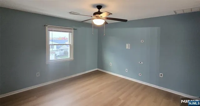 an empty room that has a window