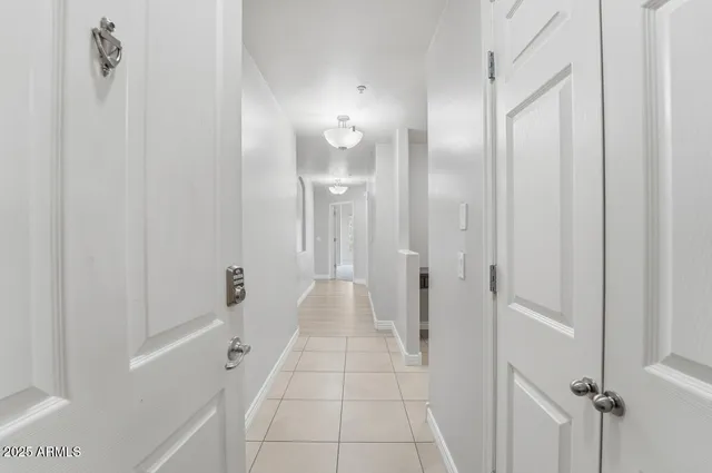 a bathroom with a mirror and a shower