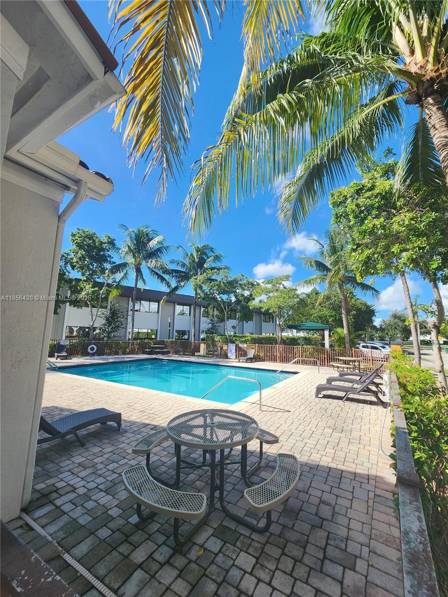 Ives Estates Miami, FL 33179 - Photo 26 of 28 a view of a backyard with palm trees