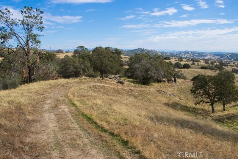 0 Millstream Madera, CA 93636 - Photo 23 of 43 a view of a lake with mountains in the background