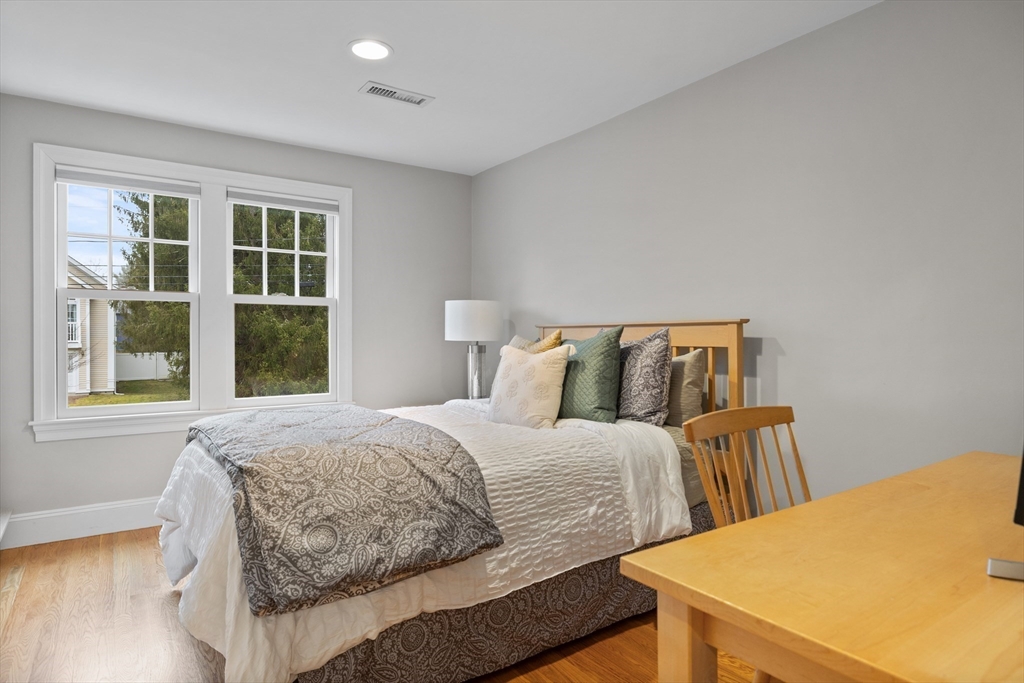 9 Augustus Road Lexington, MA 02421 - Photo 20 of 41 a bedroom with a bed and window